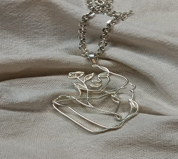 THE EMBRACING PENDENT in 92.5 Hallmarked Sterling Silver, featuring elegant floral design on a delicate chain.